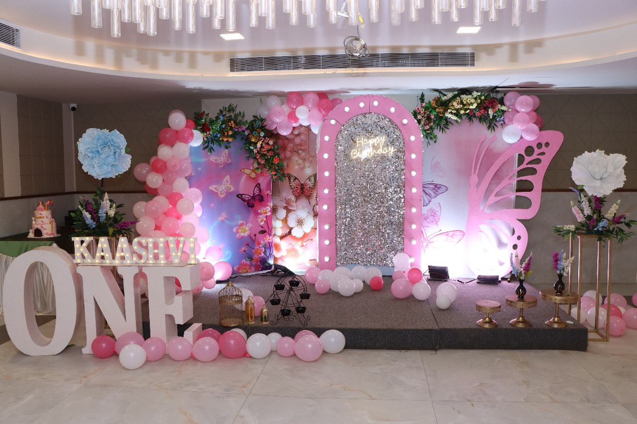 Butterfly Blush One — A sequin arch, blush balloons and butterflies for Kaashvi's first birthday.